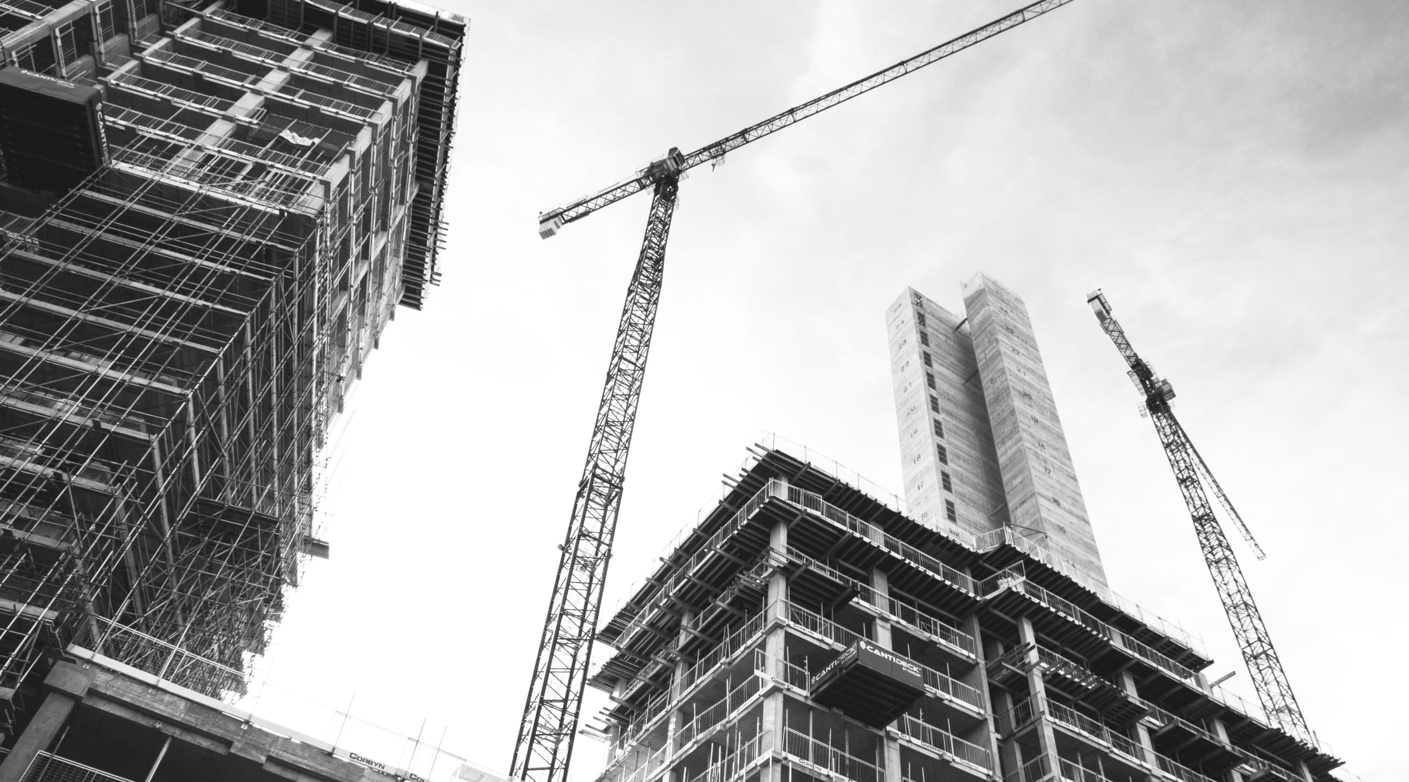 High-rise construction site with tower cranes